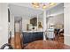 Bright, open kitchen with a large island, stainless steel appliances, and stylish decor at 4840 Brent Knoll Ln, Suwanee, GA 30024
