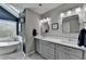 This modern bathroom features a double vanity, soaking tub and plenty of natural light at 910 Brentwood Ave, Lawrenceville, GA 30044
