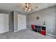 Spacious bedroom with gray walls, large closets and a decorative storage unit, newly carpeted at 910 Brentwood Ave, Lawrenceville, GA 30044