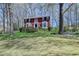 Charming two-story brick home with bay windows and a well-maintained landscaped front yard at 910 Brentwood Ave, Lawrenceville, GA 30044