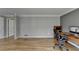 Spacious office with hardwood floors and neutral tones, providing a clean and organized atmosphere at 910 Brentwood Ave, Lawrenceville, GA 30044