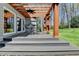 Wooden pergola with comfortable seating offers a serene outdoor retreat at 910 Brentwood Ave, Lawrenceville, GA 30044