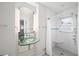Modern bathroom with a glass sink and vanity, subway tiled walls, and a shower at 1323 Christmas Ne Ln, Atlanta, GA 30329