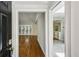 Inviting entryway showcasing hardwood floors and bright natural light, leading to an open living space at 1323 Christmas Ne Ln, Atlanta, GA 30329