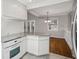 Eat-in kitchen features granite counters, white cabinets, and stainless steel appliances at 1323 Christmas Ne Ln, Atlanta, GA 30329