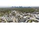 Expansive aerial view of Atlanta community with lush green spaces and skyline in background at 2013 Rockledge Ne Rd, Atlanta, GA 30324
