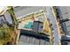 Aerial view of community pool with lounge chairs and manicured landscaping at 2013 Rockledge Ne Rd, Atlanta, GA 30324