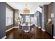 Dining area with stylish light fixtures, a modern table set, and neutral decor for a welcoming atmosphere at 2013 Rockledge Ne Rd, Atlanta, GA 30324