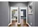 Hallway that provides access to an office and a bedroom with a gym at 2013 Rockledge Ne Rd, Atlanta, GA 30324
