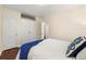 This bedroom features hardwood floors and a closet for ample storage space at 2903 Akron Street, East Point, GA 30344
