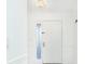 Bright foyer with white walls and a modern light fixture, offering a clean aesthetic at 64 Saint Claire Ne Ln, Atlanta, GA 30324