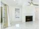Bright room features marble floors, recessed lighting, and fireplace with a marble hearth at 64 Saint Claire Ne Ln, Atlanta, GA 30324