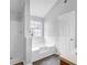 Bathroom features a tub, shower, and large window providing natural light at 2760 Carolina Rdg, Riverdale, GA 30296