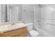 Bathroom features a single sink vanity, white toilet and bathtub with shower at 2760 Carolina Rdg, Riverdale, GA 30296
