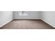 Neutral bedroom features neutral carpet and paint, bright window and electrical outlets at 2760 Carolina Rdg, Riverdale, GA 30296