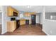 Kitchen featuring appliances, wood cabinets, and a window for natural light at 2760 Carolina Rdg, Riverdale, GA 30296