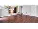 Hardwood flooring throughout the main living area leading to an open kitchen at 2760 Carolina Rdg, Riverdale, GA 30296