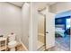 Bathroom showing a toilet and shower area, connected to the main bedroom at 399 Se Skylar Way, Atlanta, GA 30315