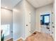 Hallway with carpet flooring leading to a bedroom at 399 Se Skylar Way, Atlanta, GA 30315