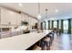 Spacious kitchen with a large island, stainless steel appliances, and white cabinetry at 399 Se Skylar Way, Atlanta, GA 30315