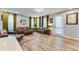 Bright living room featuring hardwood floors, stylish furnishings, and plenty of natural light at 399 Se Skylar Way, Atlanta, GA 30315