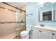 Updated bathroom featuring a glass-enclosed shower, modern vanity, and neutral color scheme at 4103 Devon Wood Ne Dr, Marietta, GA 30066