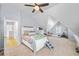 Bedroom with sloped ceilings, a bed with steps, and a small teepee at 4103 Devon Wood Ne Dr, Marietta, GA 30066