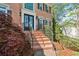 Classic brick home with a welcoming front entrance and manicured landscaping at 4103 Devon Wood Ne Dr, Marietta, GA 30066
