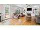 Beautiful living room with fireplace, access to screened porch, and hardwood floors at 4103 Devon Wood Ne Dr, Marietta, GA 30066