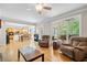 Spacious living room features hardwood floors, fireplace, and open floor plan at 4103 Devon Wood Ne Dr, Marietta, GA 30066