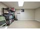 Large basement space with neutral carpet and shelving for storing items in an organized manner at 434 Shepard Sw Dr, Marietta, GA 30064