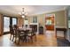 Elegant dining room with hardwood floors, chandelier, and access to the outdoor deck at 434 Shepard Sw Dr, Marietta, GA 30064