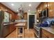 Charming kitchen featuring wooden cabinets, stainless steel appliances, and a butcher block island at 434 Shepard Sw Dr, Marietta, GA 30064