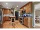 Well-equipped kitchen featuring wood cabinetry, stainless steel appliances, and ample counter space at 434 Shepard Sw Dr, Marietta, GA 30064