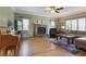 Inviting living room featuring hardwood floors, fireplace, and ample seating at 434 Shepard Sw Dr, Marietta, GA 30064