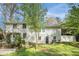 Back of home featuring a yard area and landscaping, perfect for outdoor activities and relaxation at 539 Collingwood Dr, Decatur, GA 30032