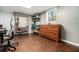 Finished basement with storage shelving, wood floors, and a neutral color palette at 539 Collingwood Dr, Decatur, GA 30032