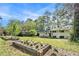 Well-maintained two-story home with lovely front yard landscaping, featuring planted flower beds at 539 Collingwood Dr, Decatur, GA 30032