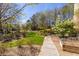 Picturesque community garden with walking paths and flowering trees at 1800 Clairmont Lk # 221, Decatur, GA 30033