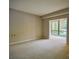 Bright and spacious living room with neutral carpet, offering a comfortable and versatile living space at 1800 Clairmont Lk # 221, Decatur, GA 30033