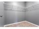 Spacious walk-in closet with wire shelving, neutral walls, and carpeted floor at 3673 Madison St, Atlanta, GA 30337