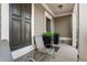Welcoming front porch featuring seating area, plants, and attractive decor at 3673 Madison St, Atlanta, GA 30337
