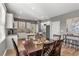 Bright eat-in kitchen featuring white cabinets and a breakfast bar at 3673 Madison St, Atlanta, GA 30337