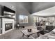 Bright living room with fireplace, vaulted ceilings, and seamless open-concept layout at 3673 Madison St, Atlanta, GA 30337