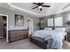 Bright main bedroom with neutral decor featuring ceiling fan and modern furniture at 3673 Madison St, Atlanta, GA 30337