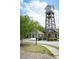 Landscaped community entrance with a clock tower at 5317 Radford Loop, Fairburn, GA 30213