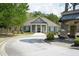 Community clubhouse with manicured landscaping at 5317 Radford Loop, Fairburn, GA 30213