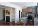 Well-appointed kitchen with stainless steel appliances, granite countertops, and center island at 5317 Radford Loop, Fairburn, GA 30213