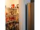 Spacious walk-in pantry offering plenty of storage for all your culinary needs and supplies at 5317 Radford Loop, Fairburn, GA 30213