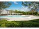 Large community swimming pool with pergola and ample deck space at 5317 Radford Loop, Fairburn, GA 30213